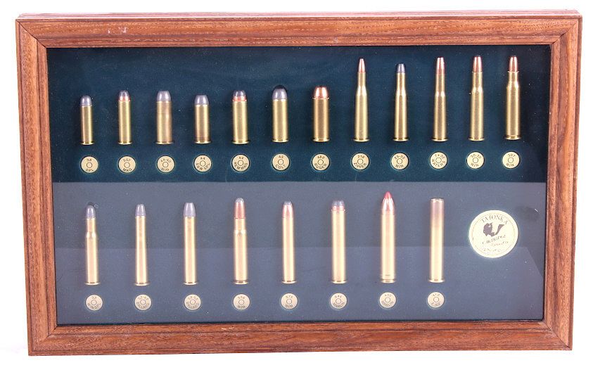 Appraisal: Tatonka Cartridge Co Bullet Display This is an elegant oak