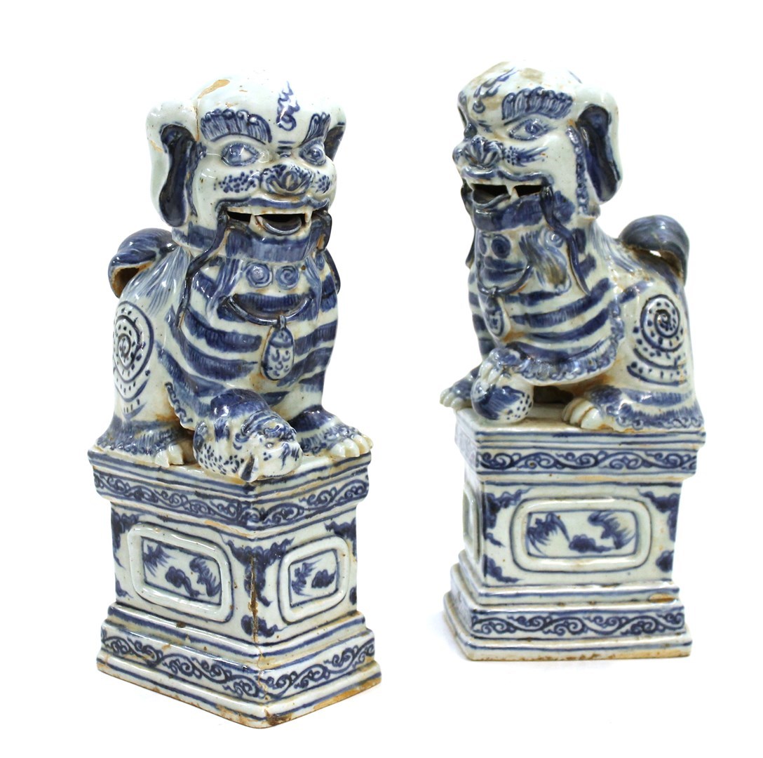 Appraisal: A pair of th century Chinese blue and white seated