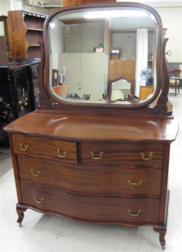 Appraisal: MAHOGANY DRESSER WITH TILT MIRROR Louis XV revival style American