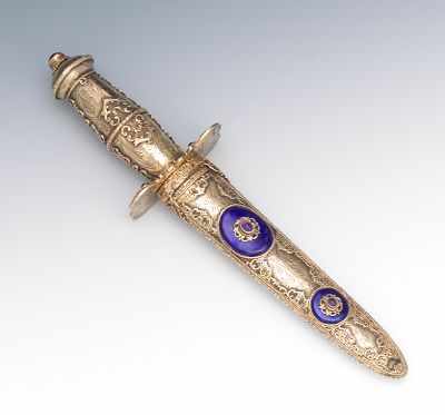 Appraisal: Sterling and enameled knife Ornate sterling silver knife and sheath