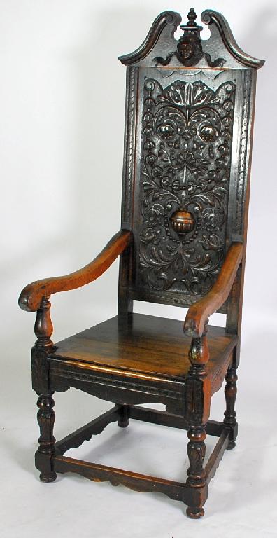 Appraisal: LATE VICTORIAN CARVED OAK HIGH BACK OPEN ARMCHAIR in the