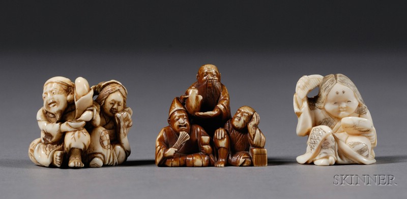 Appraisal: Three Ivory Netsuke th century a figure of Okame a