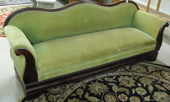 Appraisal: AN EMPIRE VICTORIAN TRANSITIONAL STYLE MAHOGANY SOFA American mid th