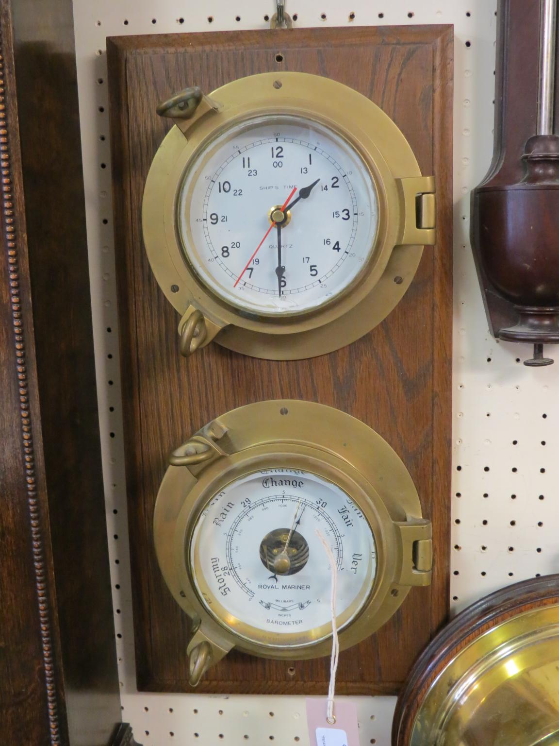 Appraisal: Two marine-type instruments quartz clock and aneroid barometer circular brass