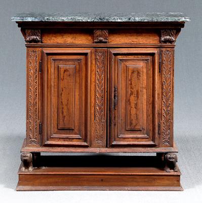 Appraisal: Italian Baroque carved walnut cabinet variegated green marble top carved