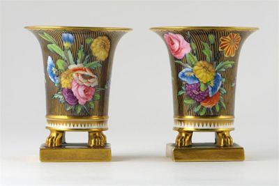 Appraisal: A pair of Spode beaker-shaped vases painted with floral arrangements