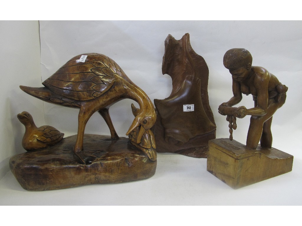 Appraisal: Three carved wooden sculptures including one of a stingray