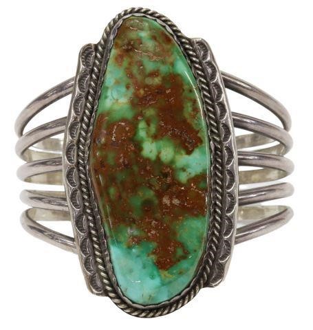 Appraisal: Southwest sterling silver cuff bracelet with large bezel-set turquoise plaque