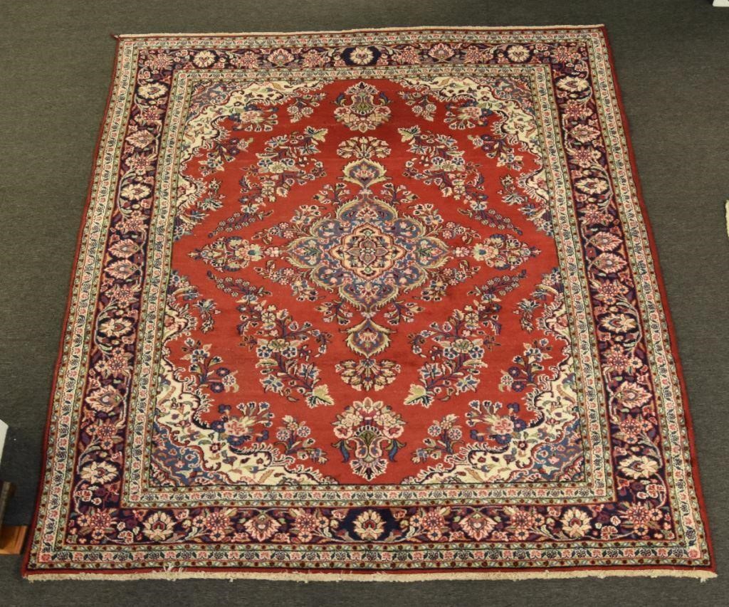 Appraisal: Tabriz center hall carpet with overall red field floral pattern