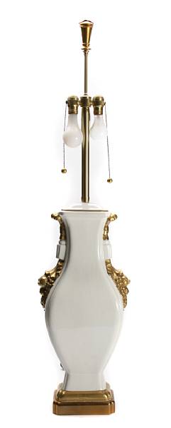 Appraisal: A gilt and blanc de chine urn form table lamp