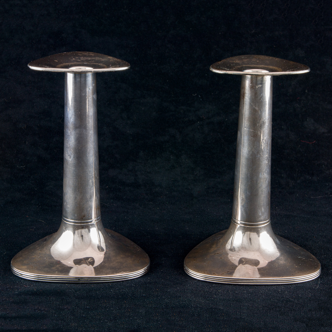 Appraisal: A DANISH STERLING PAIR CANDLESTICKS A Danish sterling pair candlesticks