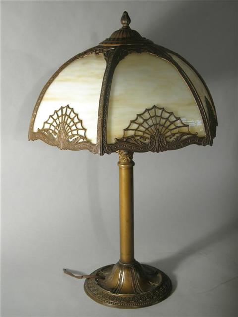 Appraisal: AMERICAN SLAG GLASS TABLE LAMP One panel to shade broken