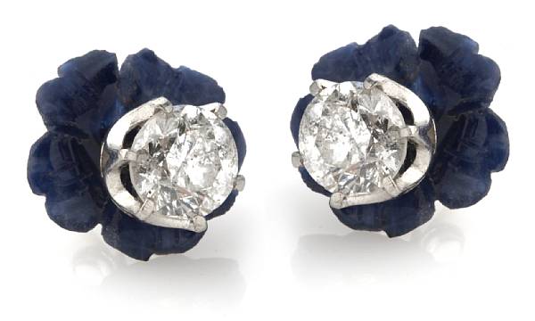 Appraisal: A pair of diamond studs with lapis lazuli jackets estimated