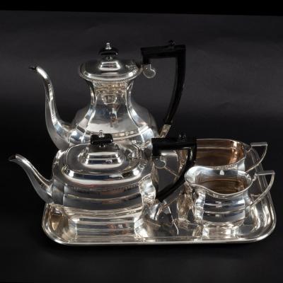 Appraisal: A silver plated four-piece tea and coffee set plated on