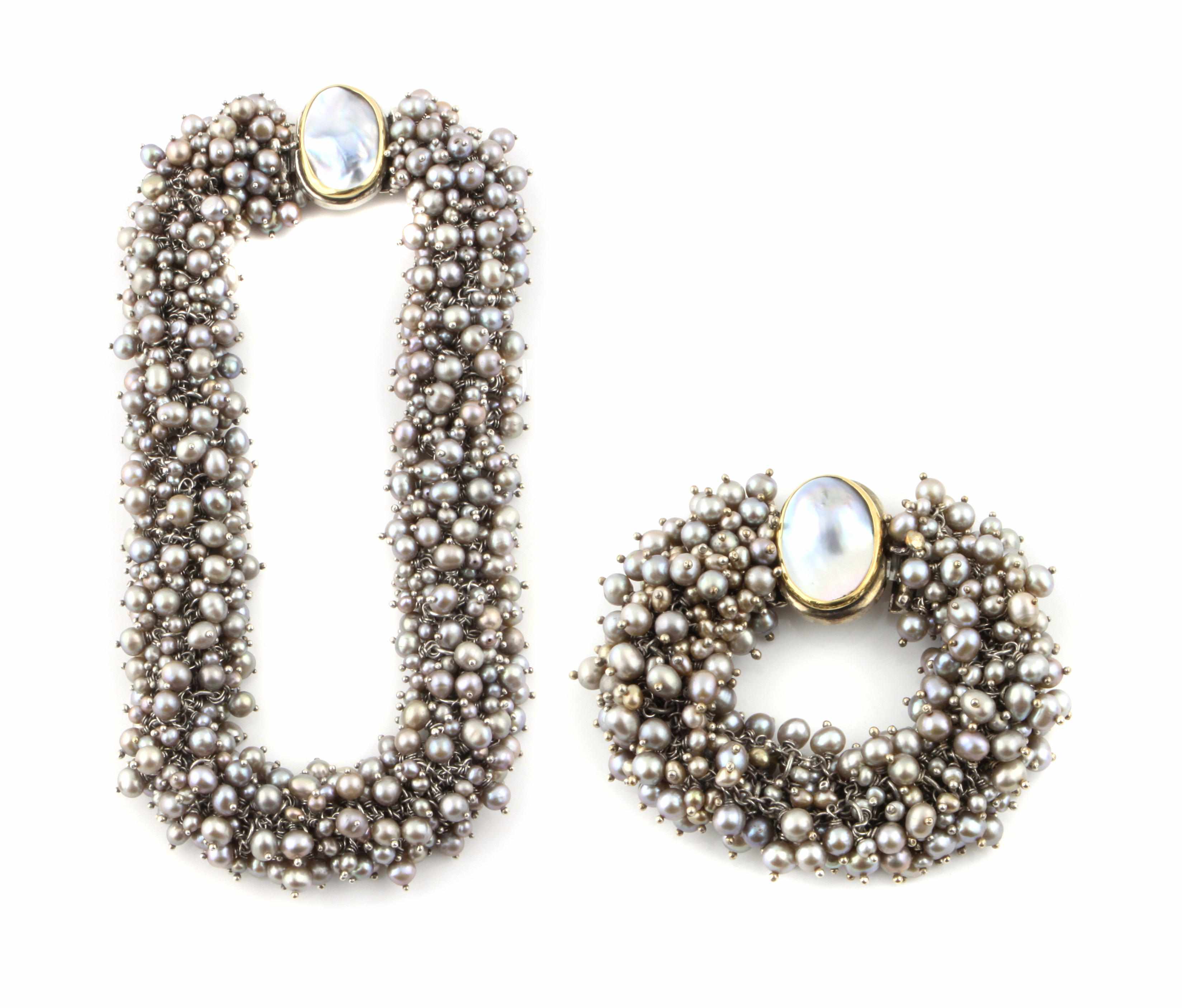 Appraisal: A colored cultured pearl and silver necklace and matching bracelet