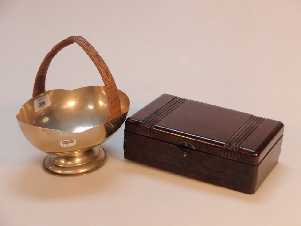 Appraisal: A Bakelite electrolysis box empty and a silver plated boat