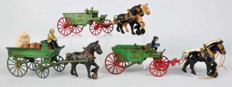 Appraisal: Lot of Cast Iron Kenton Horse-Drawn Toys Includes two sand