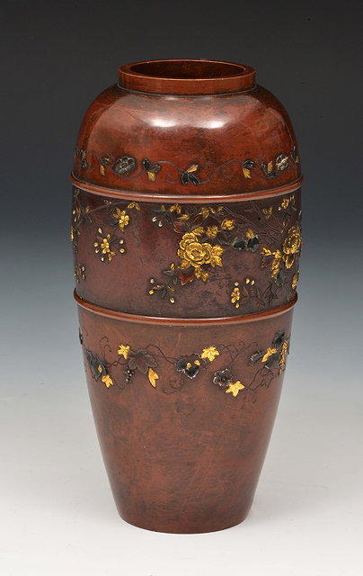 Appraisal: A Japanese bronze vaseMeiji periodHattori workshop inlaid in gold and