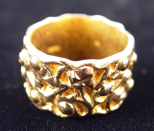 Appraisal: K YELLOW GOLD BAND RING Repousse design band approx ''