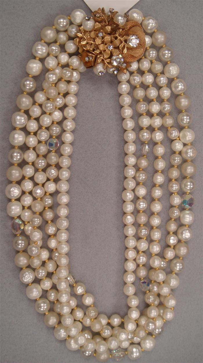 Appraisal: Five strands of faux pearls interspersed with crystal and featuring