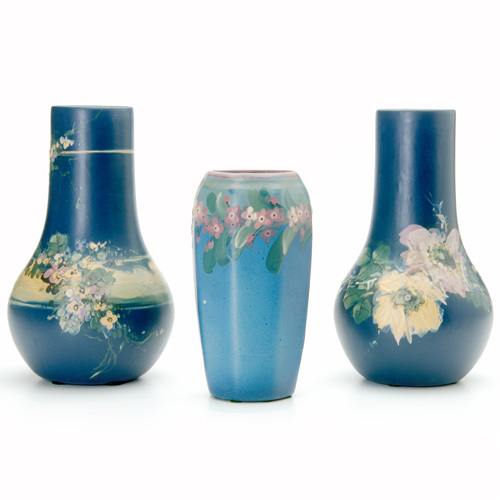 Appraisal: WELLER Three Blue and Decorated Hudson vases two bottle-shaped painted