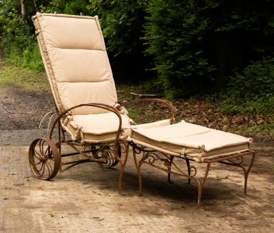 Appraisal: An iron framed deck chair with adjustable back and separate