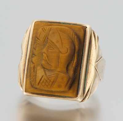 Appraisal: A Gentleman's Carved Tigereye Cameo Ring k yellow gold ring