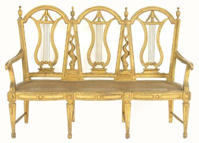 Appraisal: A th century giltwood triple chair back settee having lyre