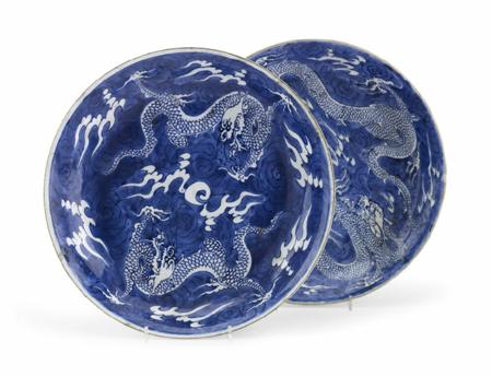 Appraisal: A near pair of Chinese blue painted chargers Kangxi period