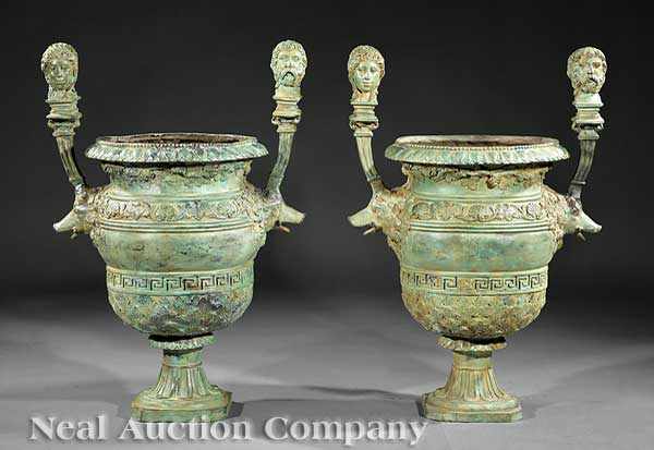 Appraisal: A Pair of Neoclassical-Style Patinated Bronze Jardini res opposing Janus