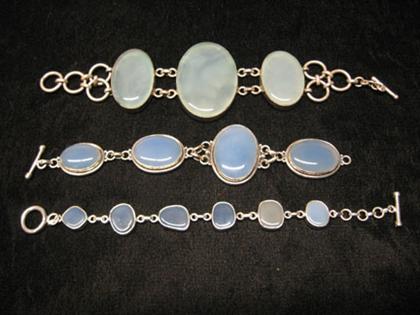 Appraisal: Group of three agate stone bracelets All set in sterling