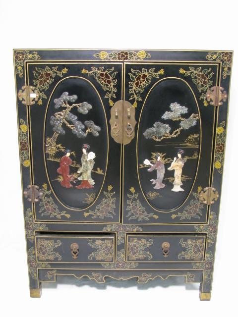 Appraisal: Chinese black lacquered chinoiserie two door and two drawer cabinet