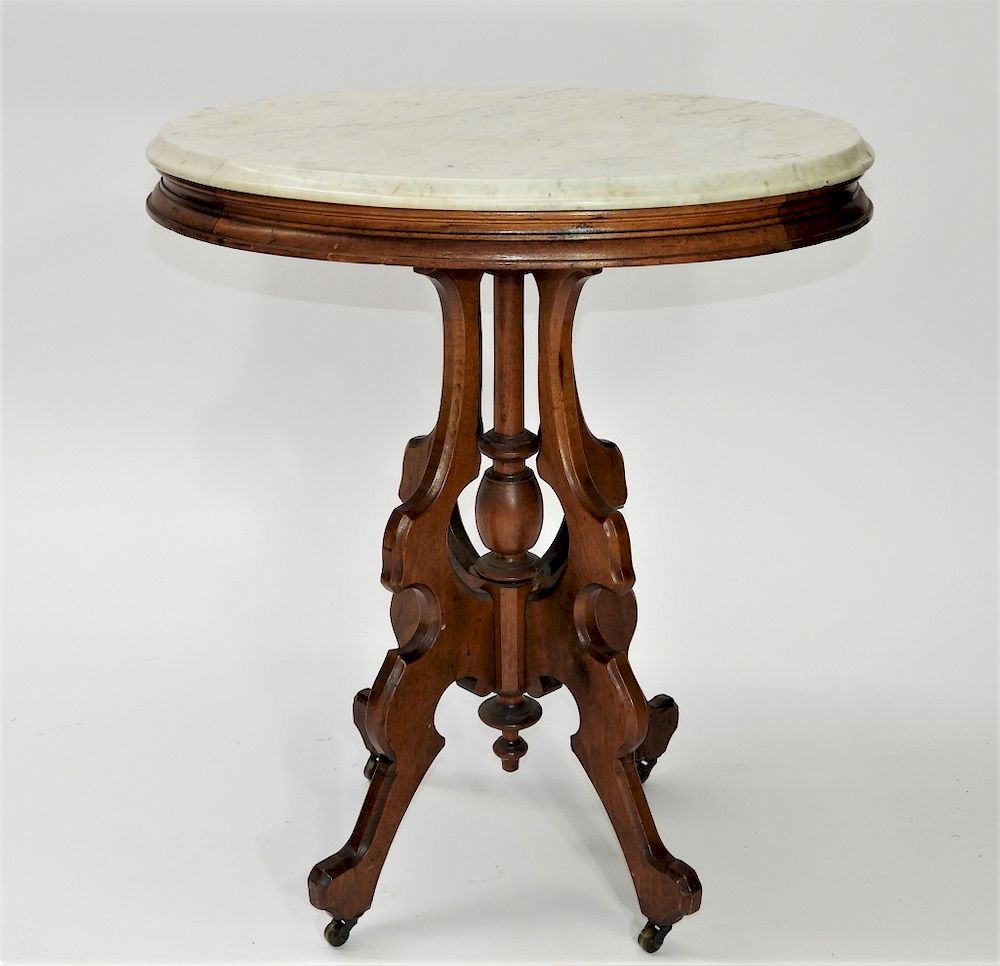 Appraisal: C Victorian Walnut Oval Marble Top Table United States Circa