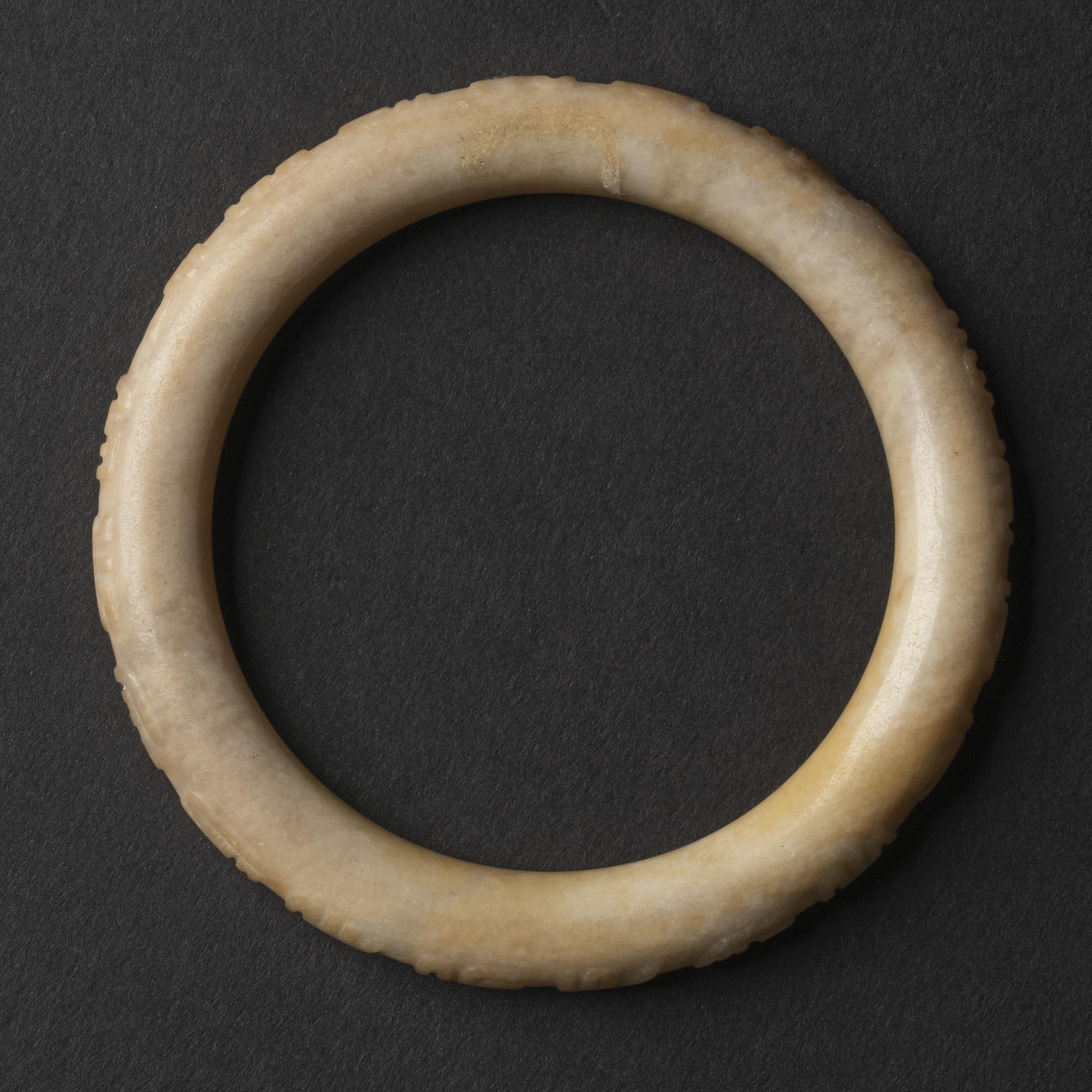 Appraisal: A White Jade Bangle with Inscription Ming Dynasty - The