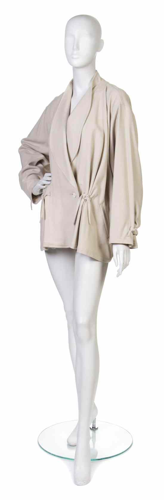 Appraisal: An Issey Miyake Cream Wool Jacket knot details at cuffs