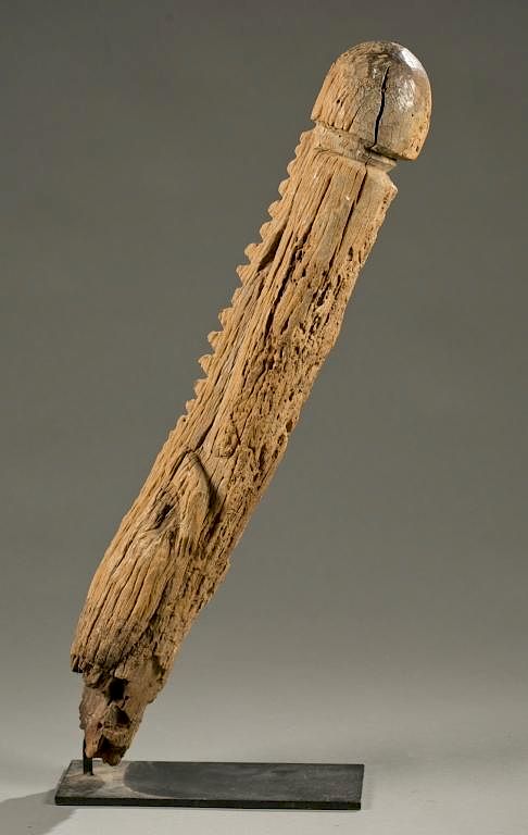 Appraisal: West African phallus sculpture th century A large desiccated wooden