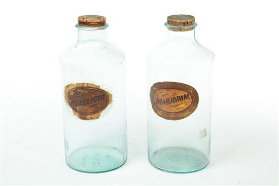 Appraisal: TWO APOTHECARY JARS American mid th century Pale aqua blown