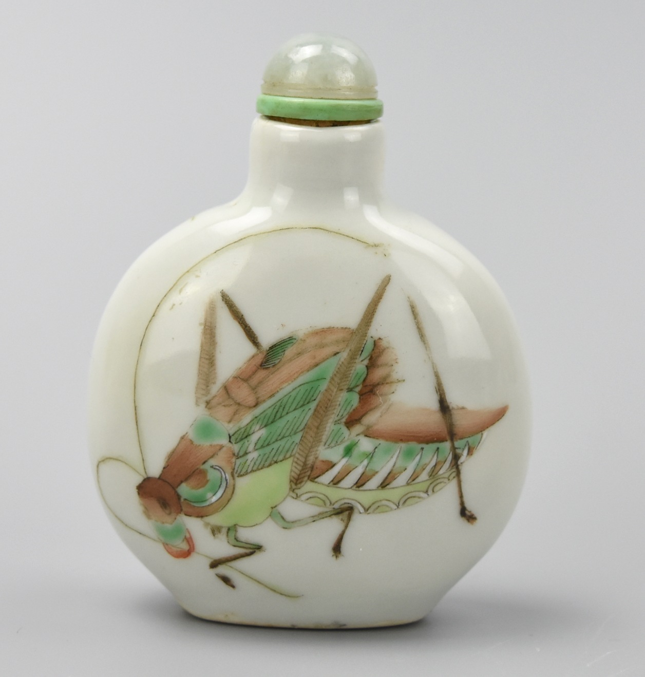 Appraisal: CHINESE FAMILLE CRICKET SNUFF BOTTLE DAOGUANG P this snuff bottle