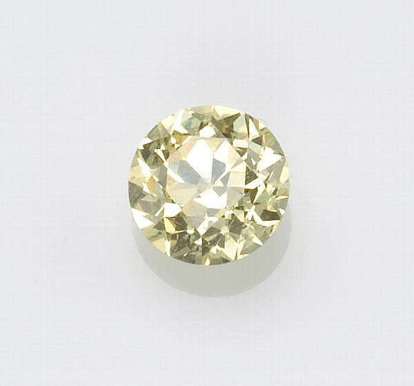 Appraisal: An unmounted colored diamond the round-brilliant yellow diamond weighing cts