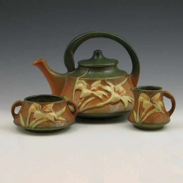 Appraisal: Roseville Zephyr Lily tea set including a -T lidded teapot