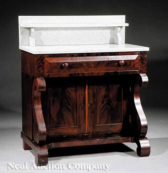 Appraisal: An American Late Classical Mahogany Washstand c white marble top