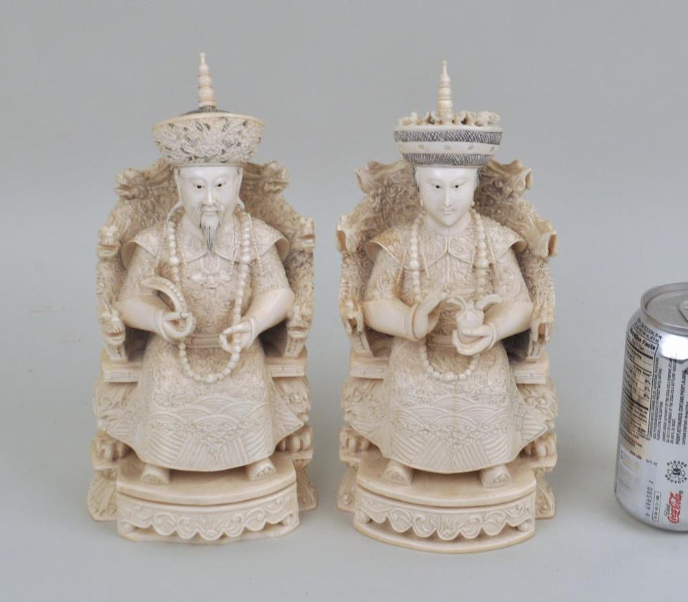 Appraisal: Pair Carved Chinese Emperor Empress Figures seated on thrones signed