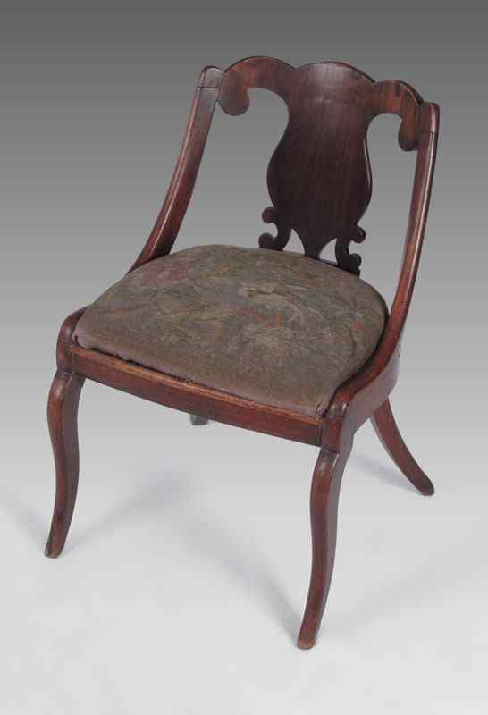 Appraisal: EMPIRE PERIOD SOLID MAHOGANY SIDE CHAIR Pegged construction curved back