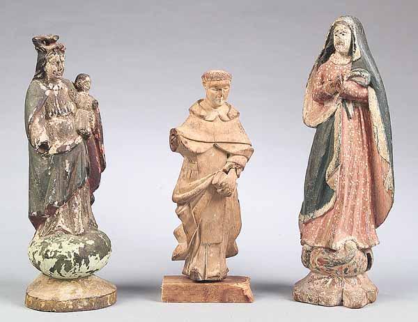 Appraisal: A Group of Three Decorative Carved Wood Santos Figures depicting