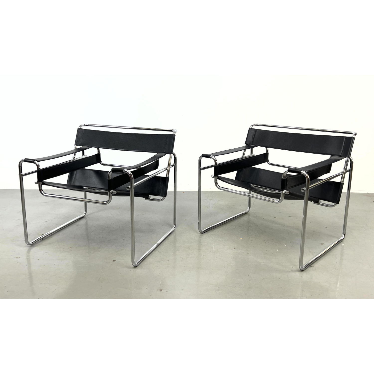 Appraisal: Pr Wassily Lounge Chairs Black Leather Chrome Tube Frame Lounge