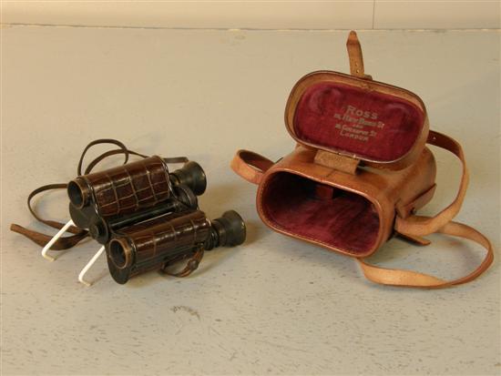 Appraisal: Pair of metal and crocodile skin binoculars by Ross of