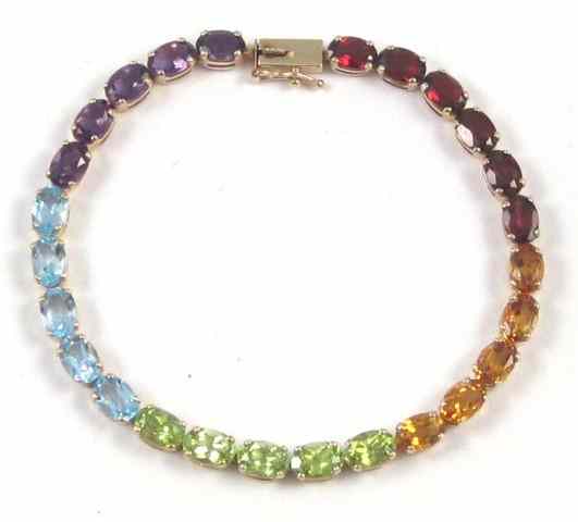 Appraisal: COLOR GEMSTONE AND YELLOW GOLD BRACELET - '' in length