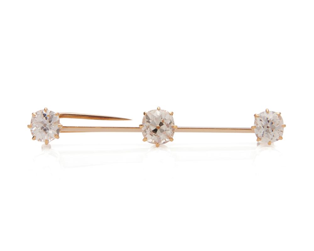 Appraisal: K Gold and Diamond Brooch the bar brooch featuring three