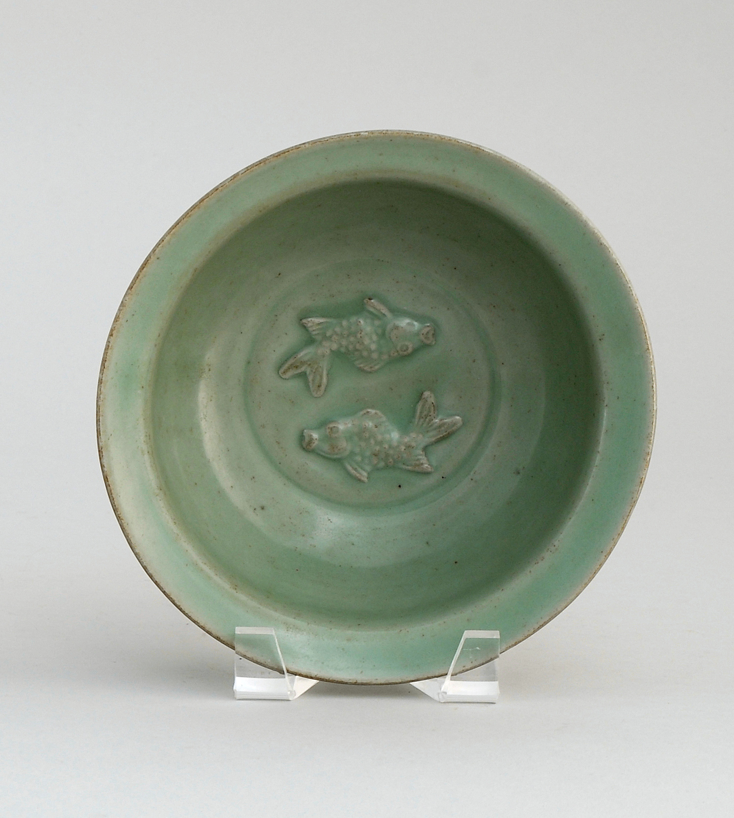 Appraisal: CELADON PORCELAIN BOWL Early th CenturyWith inverted rim and relief