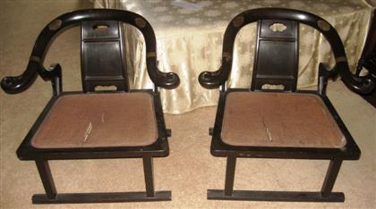 Appraisal: Two Chinese hardwood horseshoe chairs th century